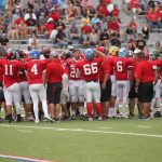 Red team huddled